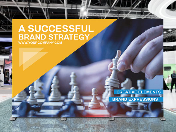 Standing, colorful SEG fabric banner reading a successful brand strategy and featuring chess